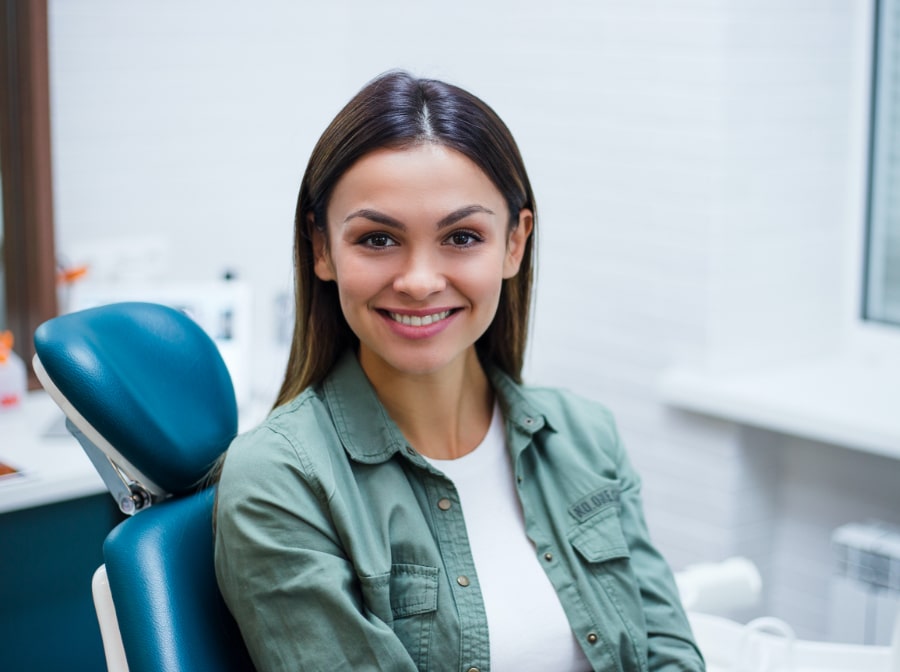 Woman smiling during preventive dentistry visit